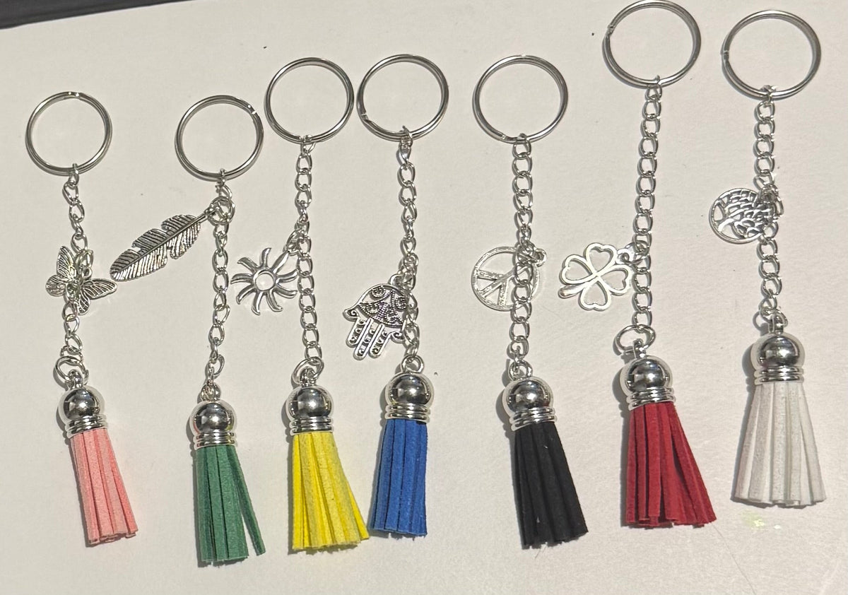Tassel keyrings in assorted colours with silver charms