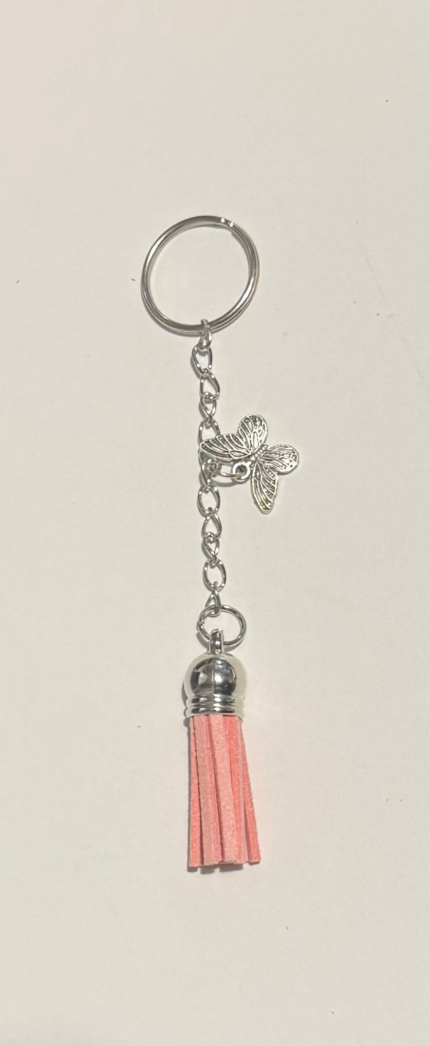 Yellow tassel keyring with silver sun charm