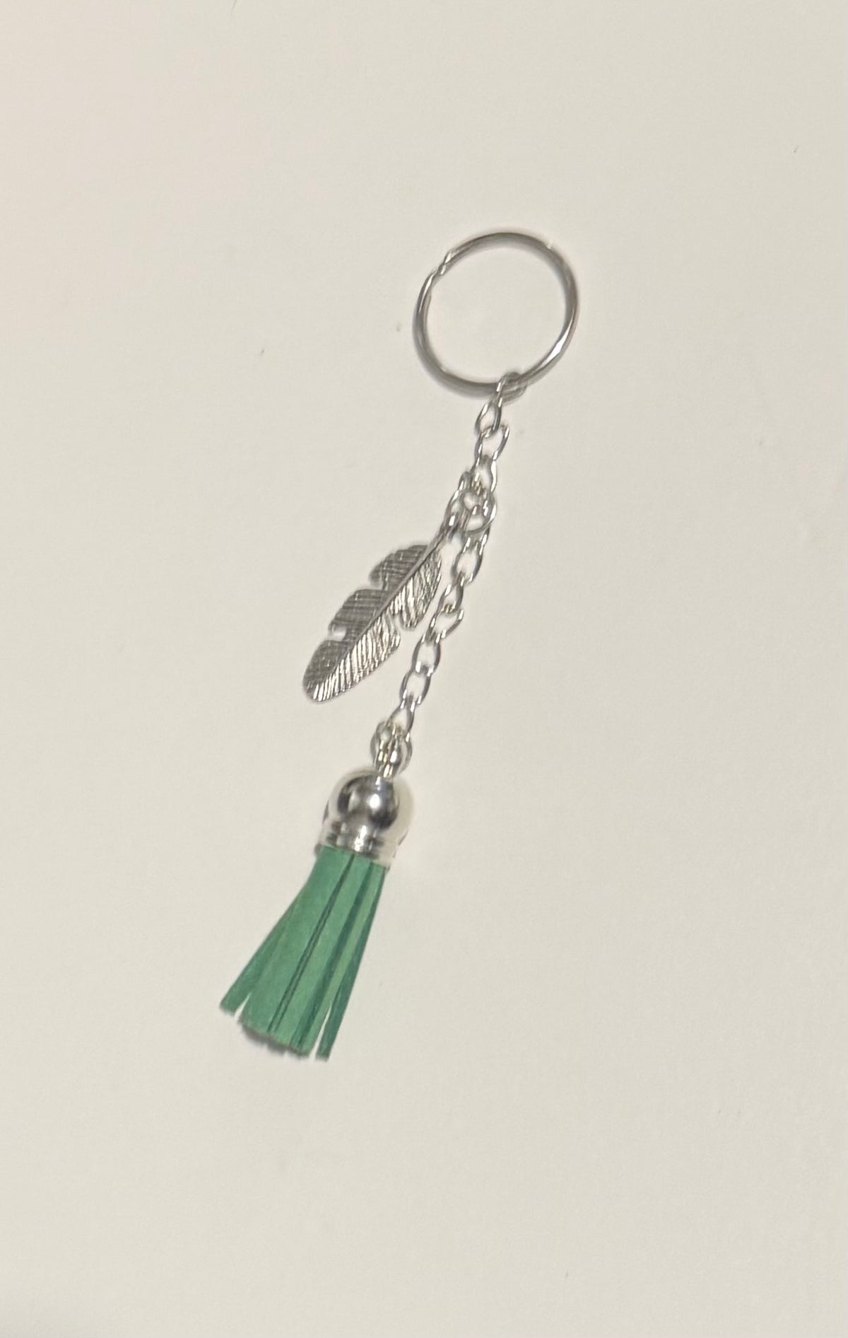 Blue tassel keyring with silver hamsa hand charm