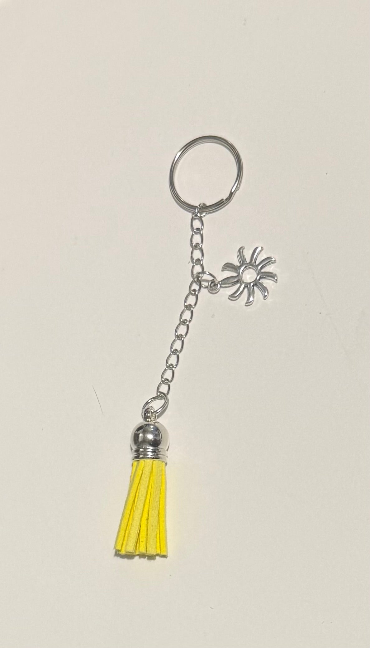 Black tassel keyring with silver peace sign charm