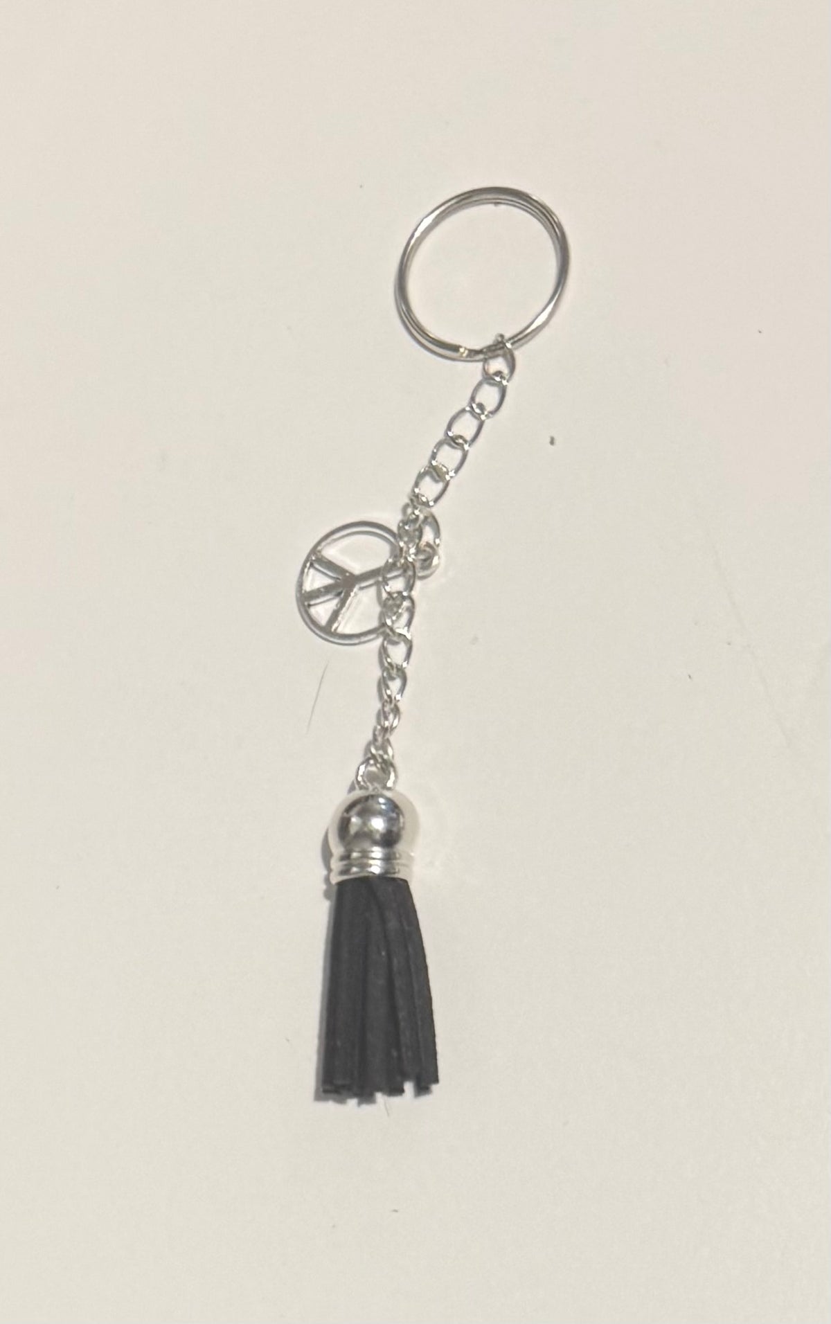 White tassel keyring with silver tree of life charm