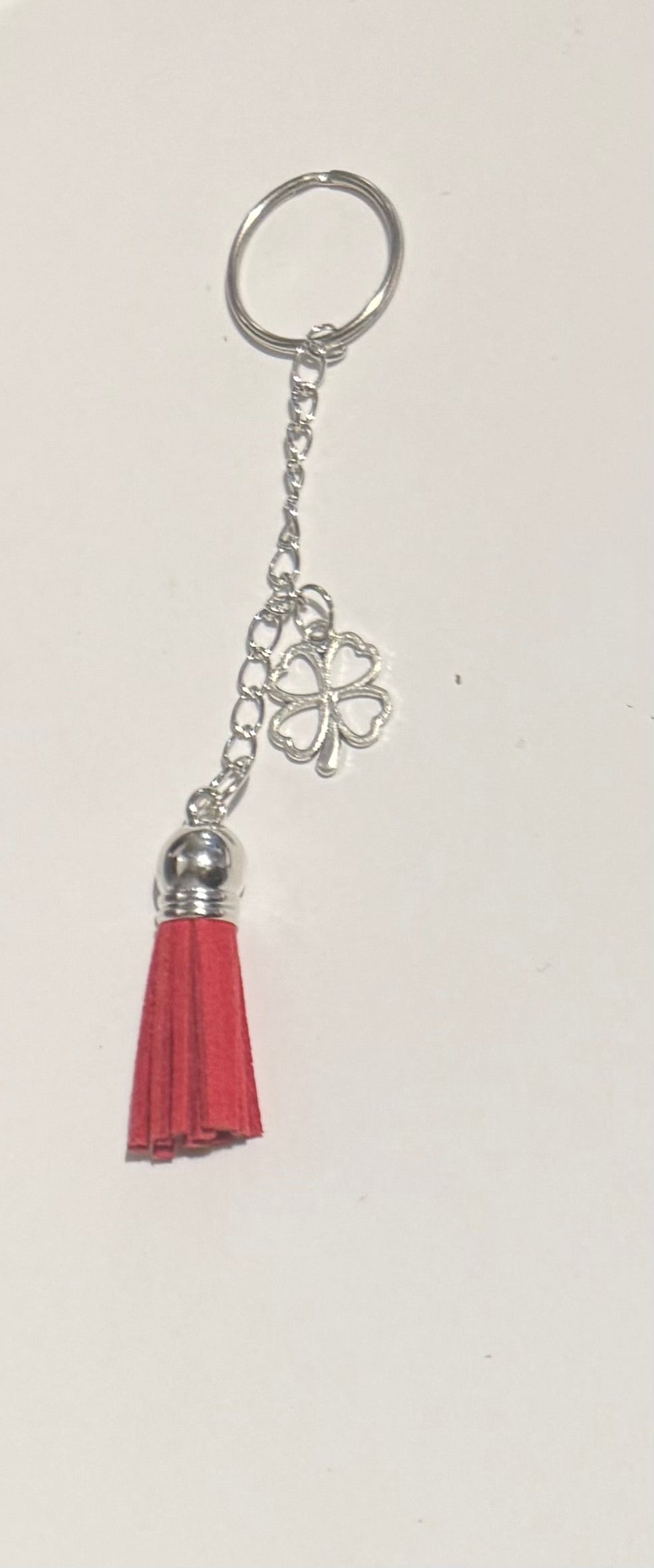 Purple tassel keyring with silver shell charm