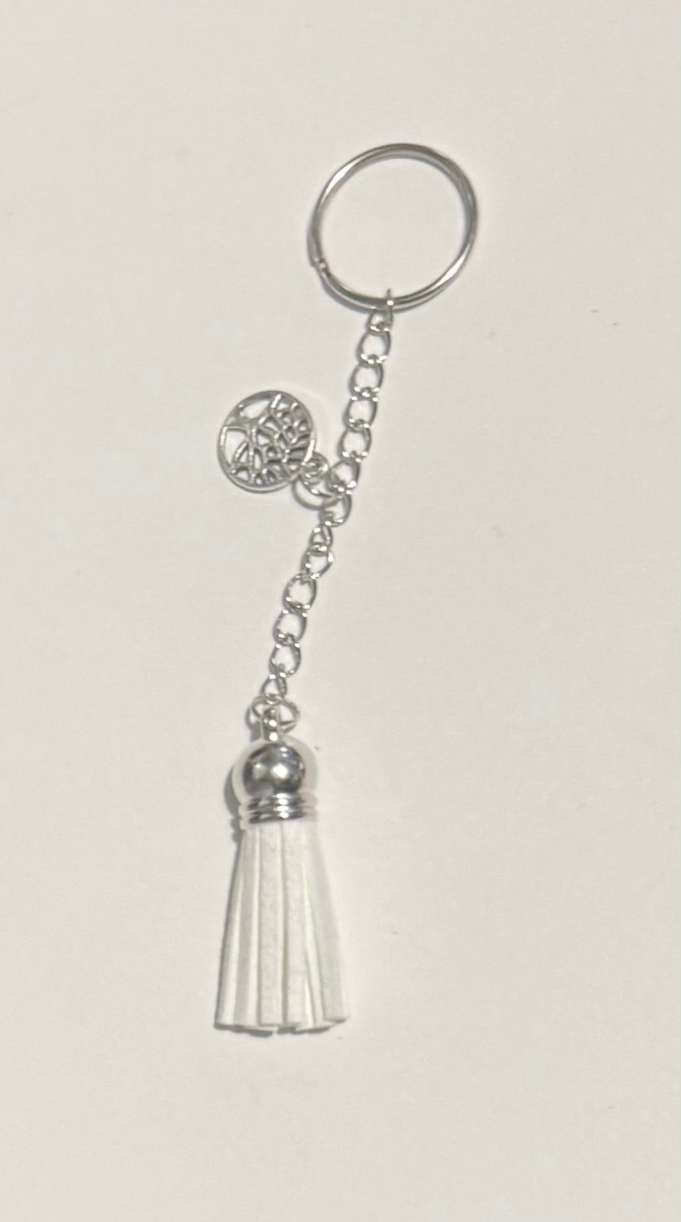 Tassel keyring with silver charm